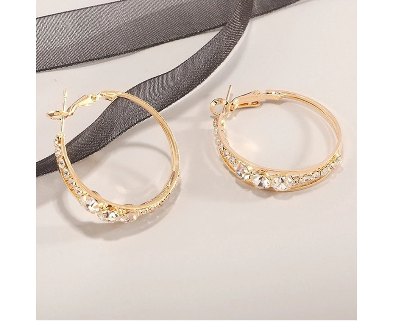 "Stunning Golden Hoop Earrings with Shiny Rhinestone Inlay - Perfect for Parties!"