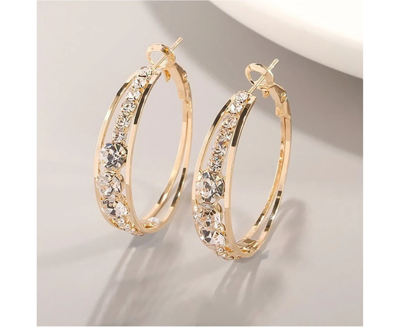 "Stunning Golden Hoop Earrings with Shiny Rhinestone Inlay - Perfect for Parties!"